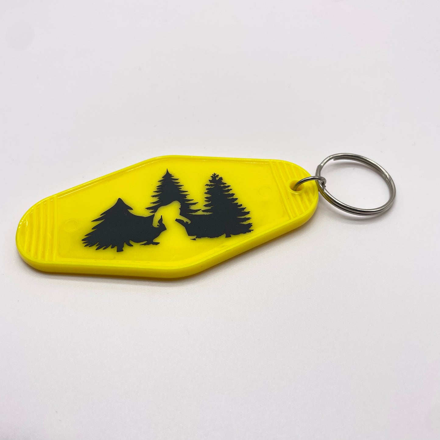 Bigfoot in Trees Hotel Keychain