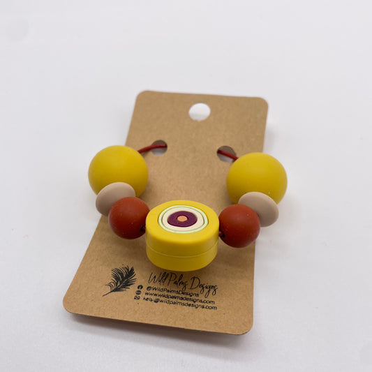 Mustard Bullseye Brick Silicone Bead Bag Tag / Charm