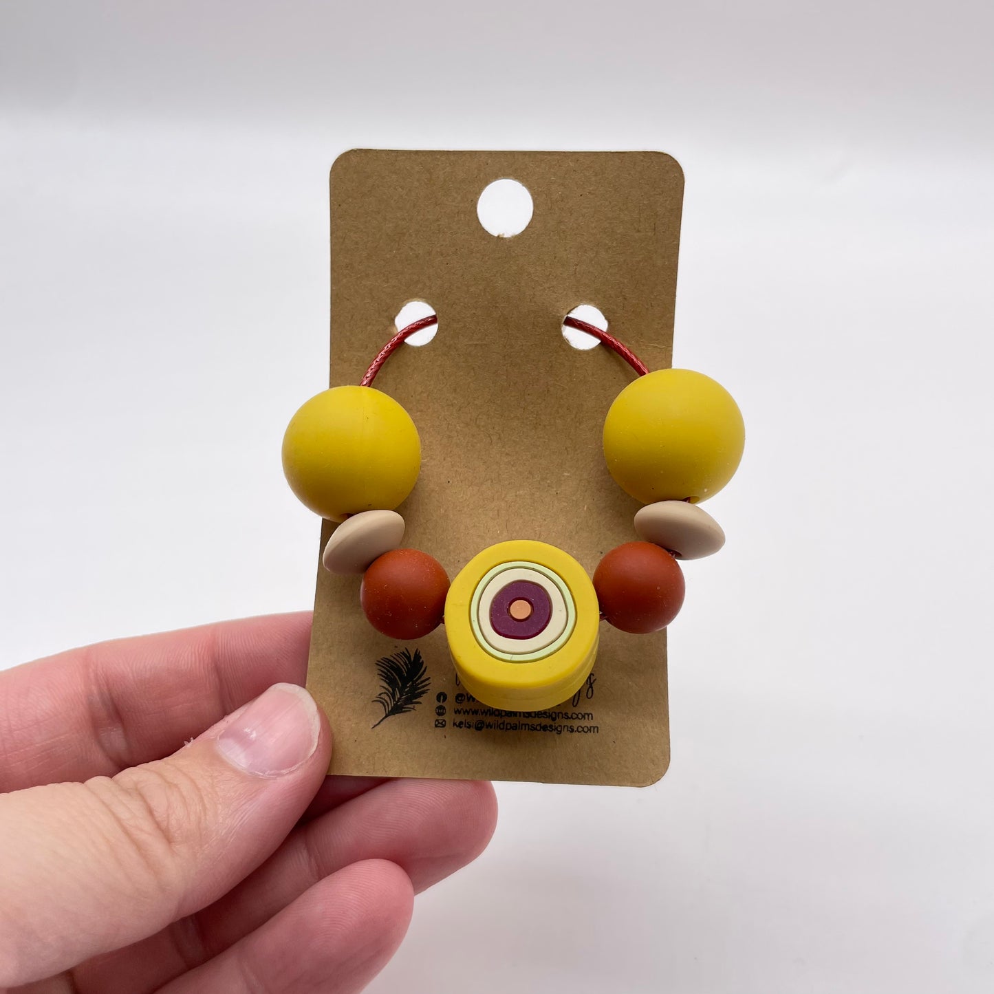 Mustard Bullseye Brick Silicone Bead Bag Tag / Charm