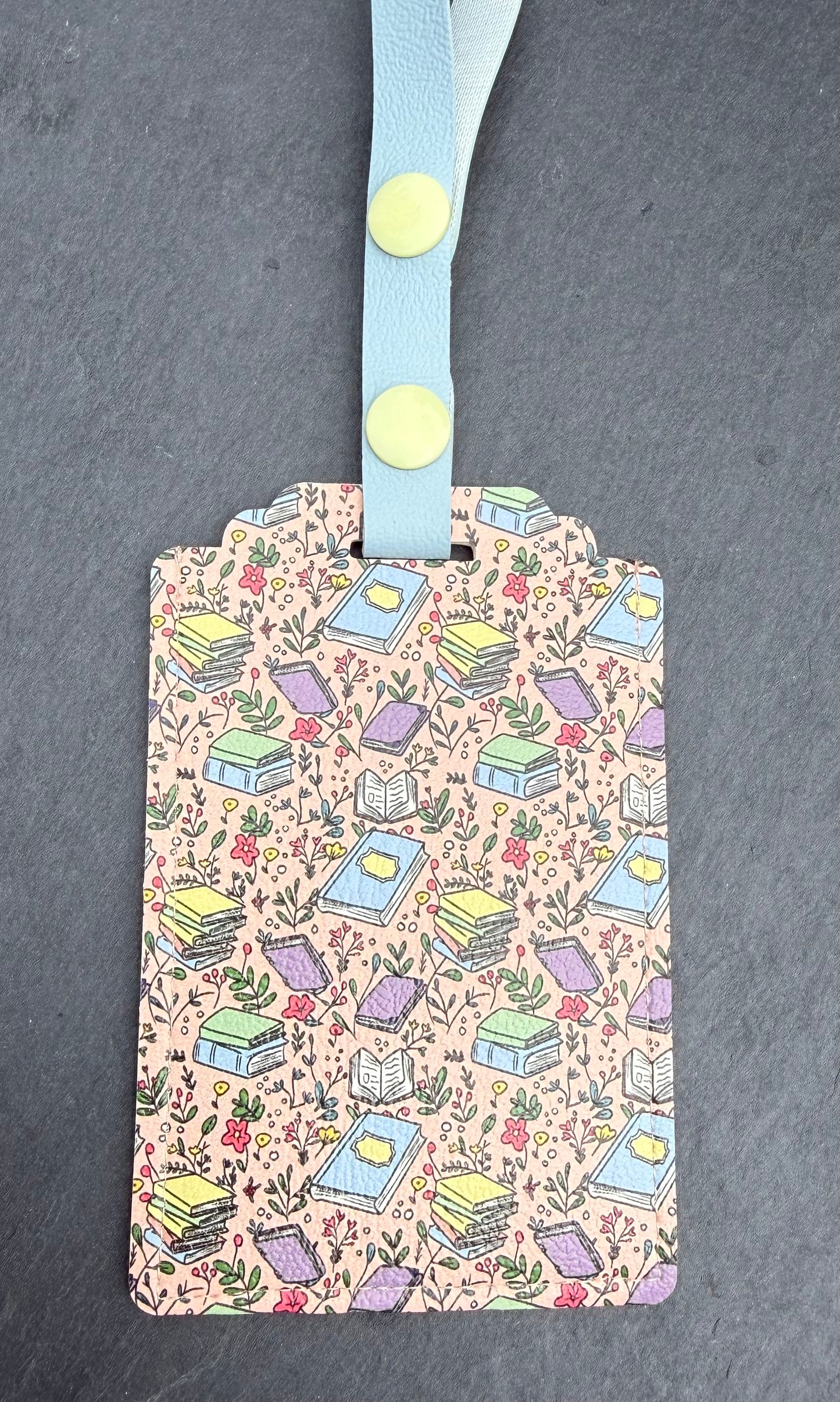 Books Floating on Pink Luggage Tag