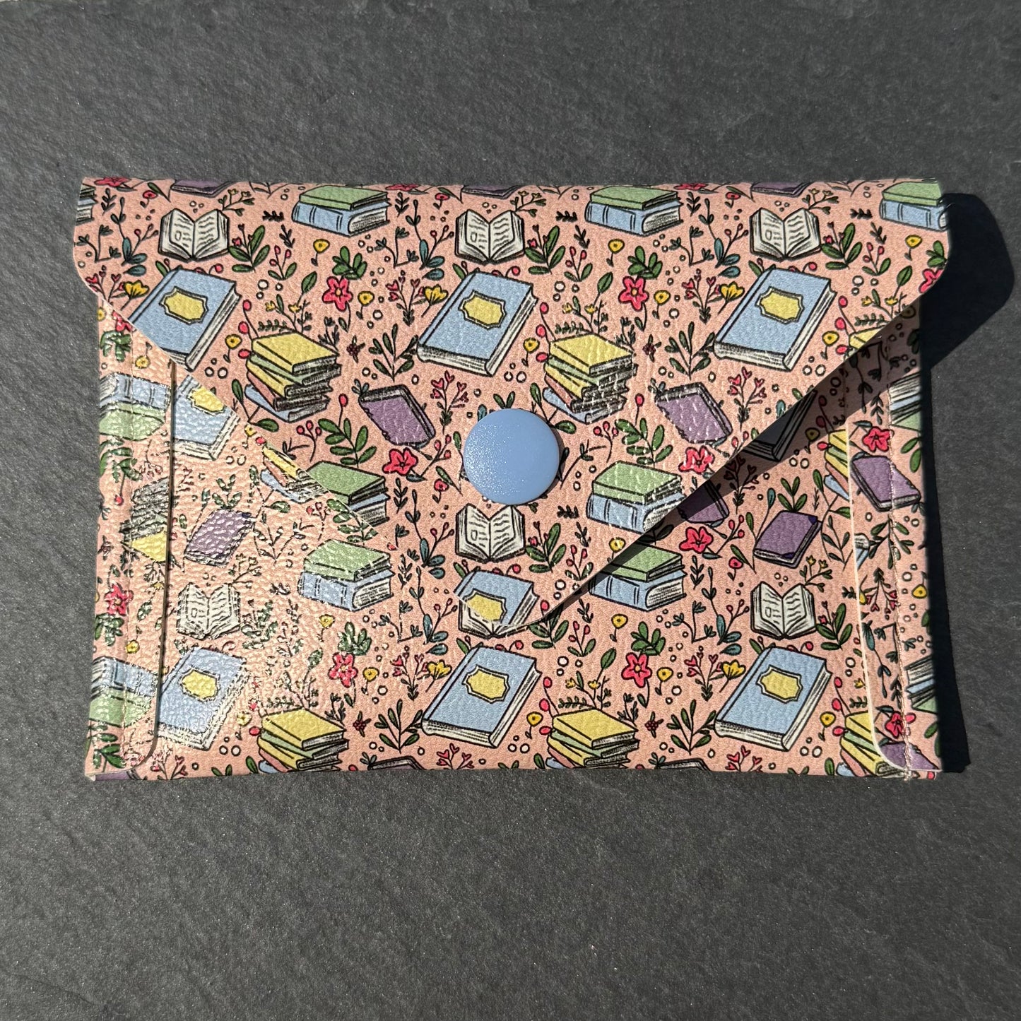 Books Floating on Pink Card Wallet