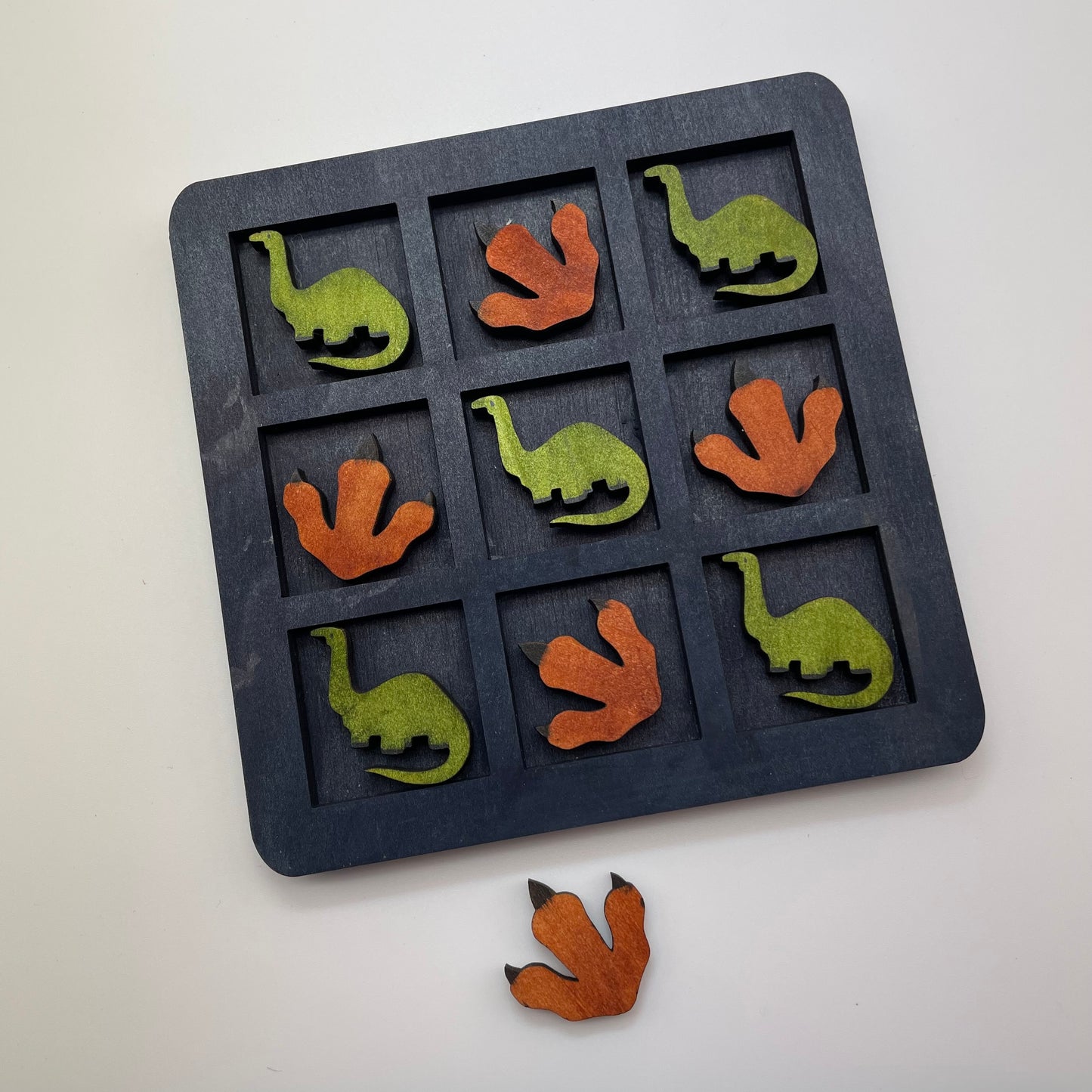 Dinosaur and Footprint Tic Tac Toe Game