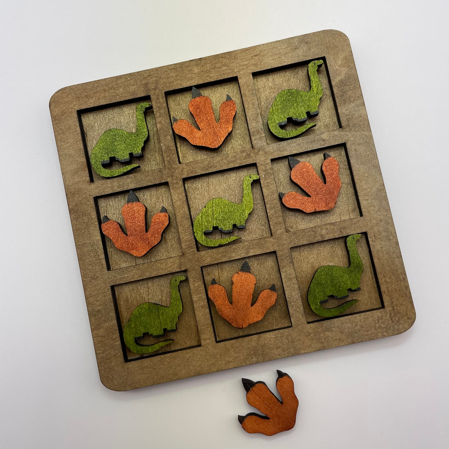 Dinosaur and Footprint Tic Tac Toe Game