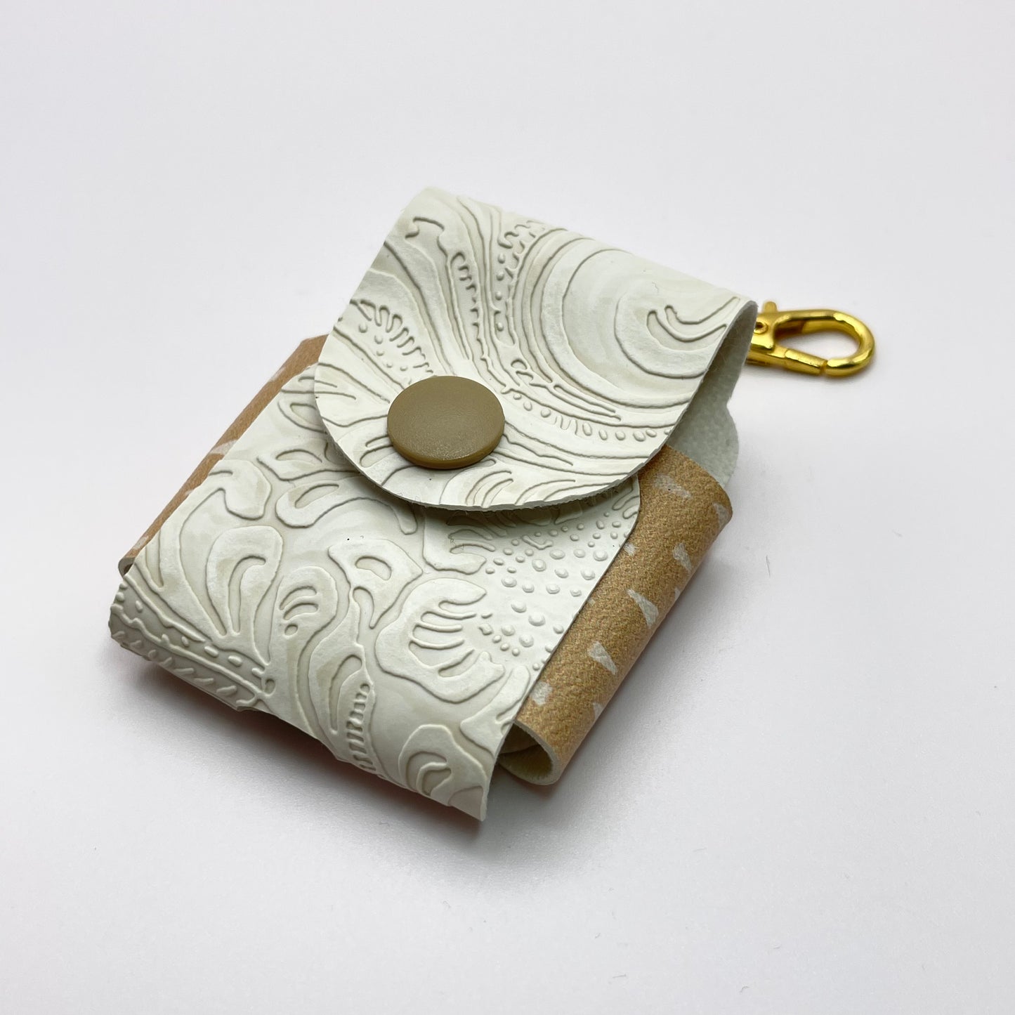 Ivory Embossed 1st Gen AirPod Keychain